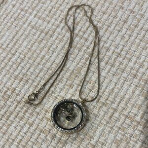 Elegant Gold and Silver Pendant Necklace